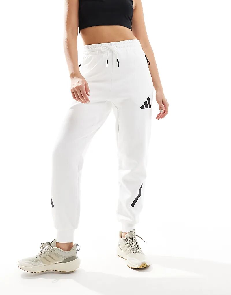 Спортивные брюки премиум-класса adidas Originals ZNE белого цвета Adidas Performance
Спортивные брюки премиум-класса adidas Originals ZNE белого цвета Adidas Performance