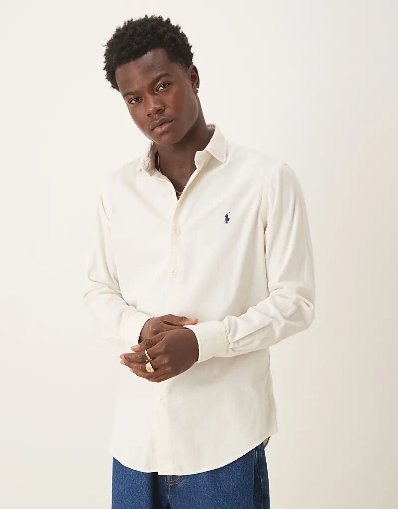Рубашка с длинными рукавами и логотипом Polo Ralph Lauren кремового цвета
Рубашка с длинными рукавами и логотипом Polo Ralph Lauren кремового цвета