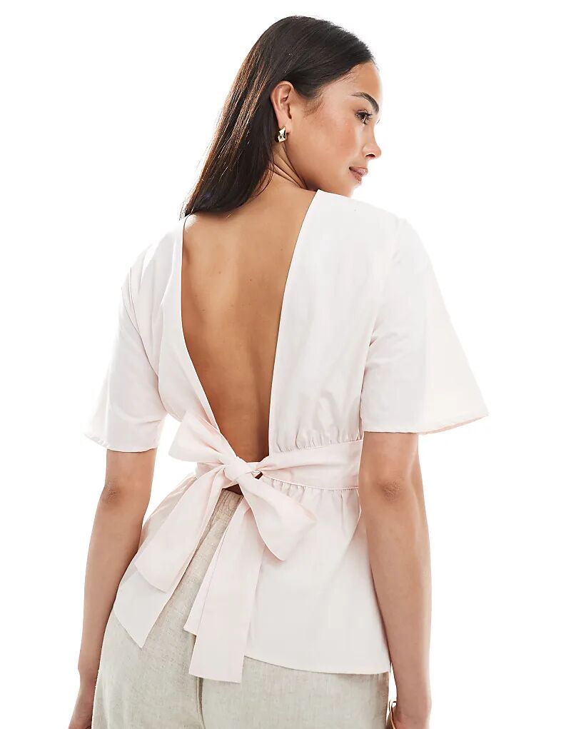 Блузка ASOS DESIGN с завязкой на талии и открытой спиной розового цвета
Блузка ASOS DESIGN с завязкой на талии и открытой спиной розового цвета