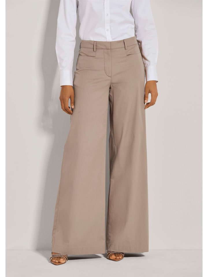 MADELEINE Широкие брюки с карманами в берберском стиле
MADELEINE Широкие брюки с карманами в берберском стиле