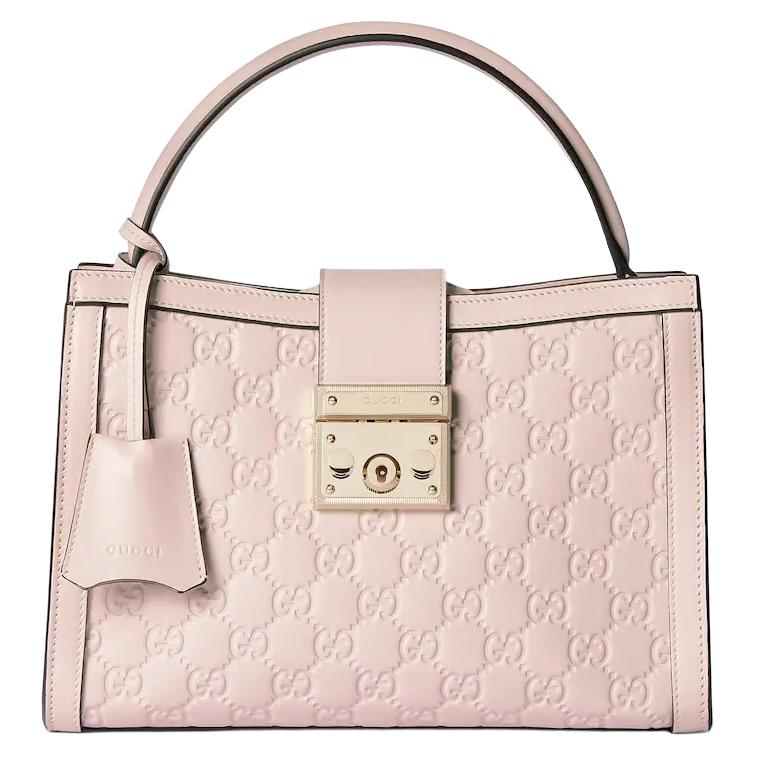 GUCCI Кожаная сумка через плечо с замком
GUCCI Кожаная сумка через плечо с замком