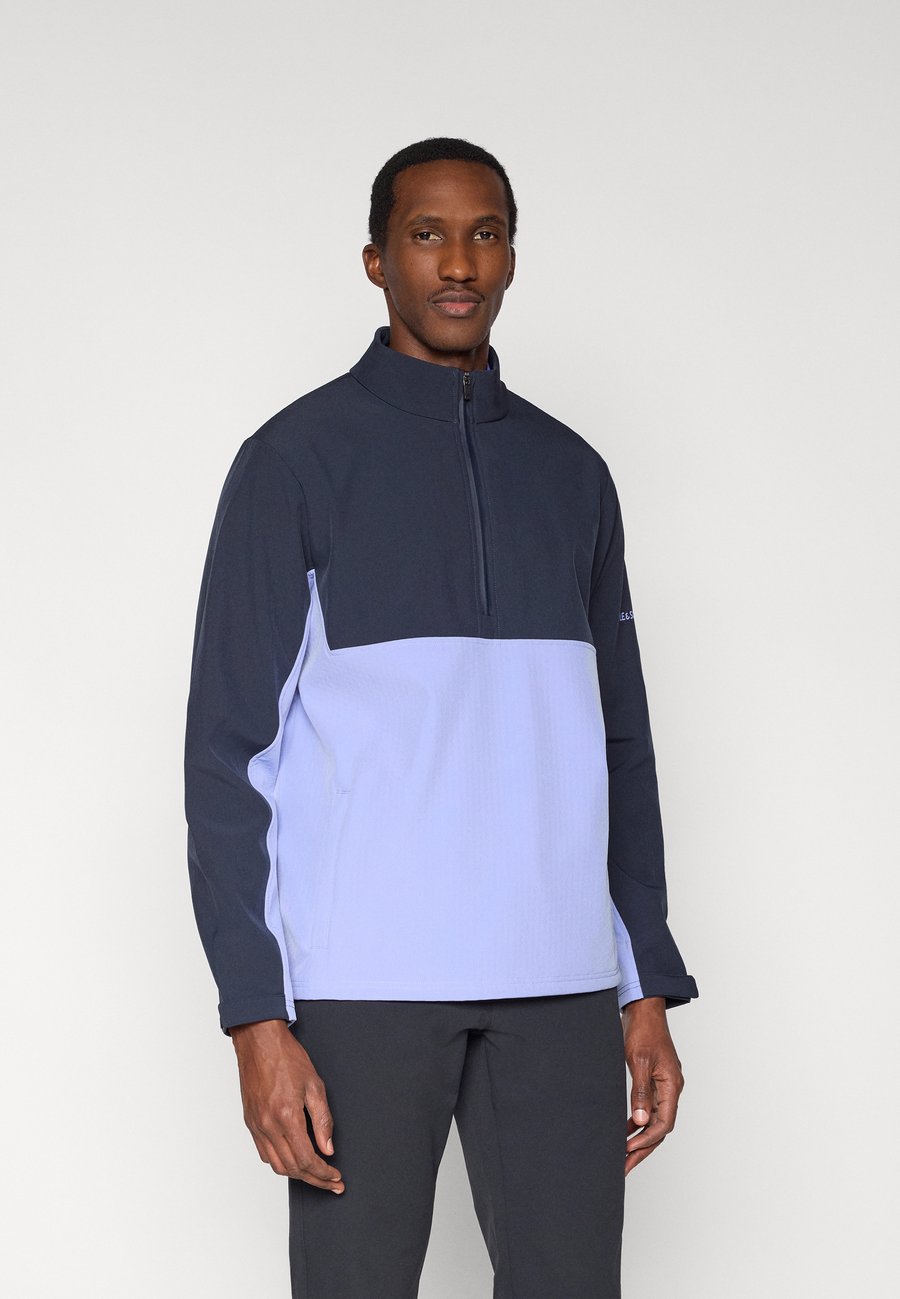 Куртка Lyle & Scott GOLF HALF ZIP WINDJAMMER JACKET, Moonlight/Dark Navy/Dark Blue
Куртка Lyle & Scott GOLF HALF ZIP WINDJAMMER JACKET, Moonlight/Dark Navy/Dark Blue