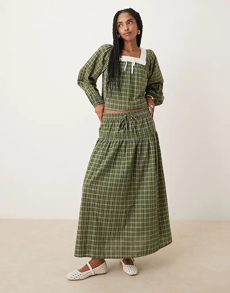 Юбка мидакси Neon Rose в многоуровневую клетку бежевого цвета
Юбка мидакси Neon Rose в многоуровневую клетку бежевого цвета