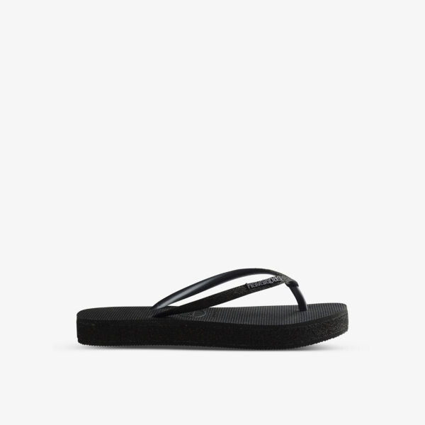 Тонкие резиновые шлепанцы на плоской подошве с блестящими ремешками Havaianas, черный
Тонкие резиновые шлепанцы на плоской подошве с блестящими ремешками Havaianas, черный