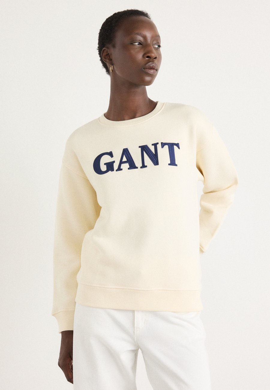Толстовка GANT GRAPHIC C NECK, Cream/Off-White
Толстовка GANT GRAPHIC C NECK, Cream/Off-White