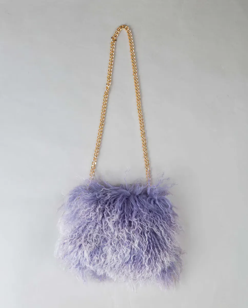 Многопозиционная сумка из тибетской овчины De la Roca, синий
Многопозиционная сумка из тибетской овчины De la Roca, синий