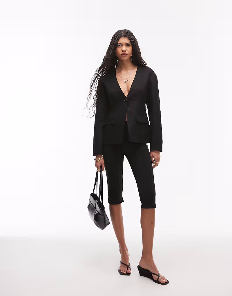 Льняной блейзер Topshop без воротника с овальными рукавами черного цвета
Льняной блейзер Topshop без воротника с овальными рукавами черного цвета