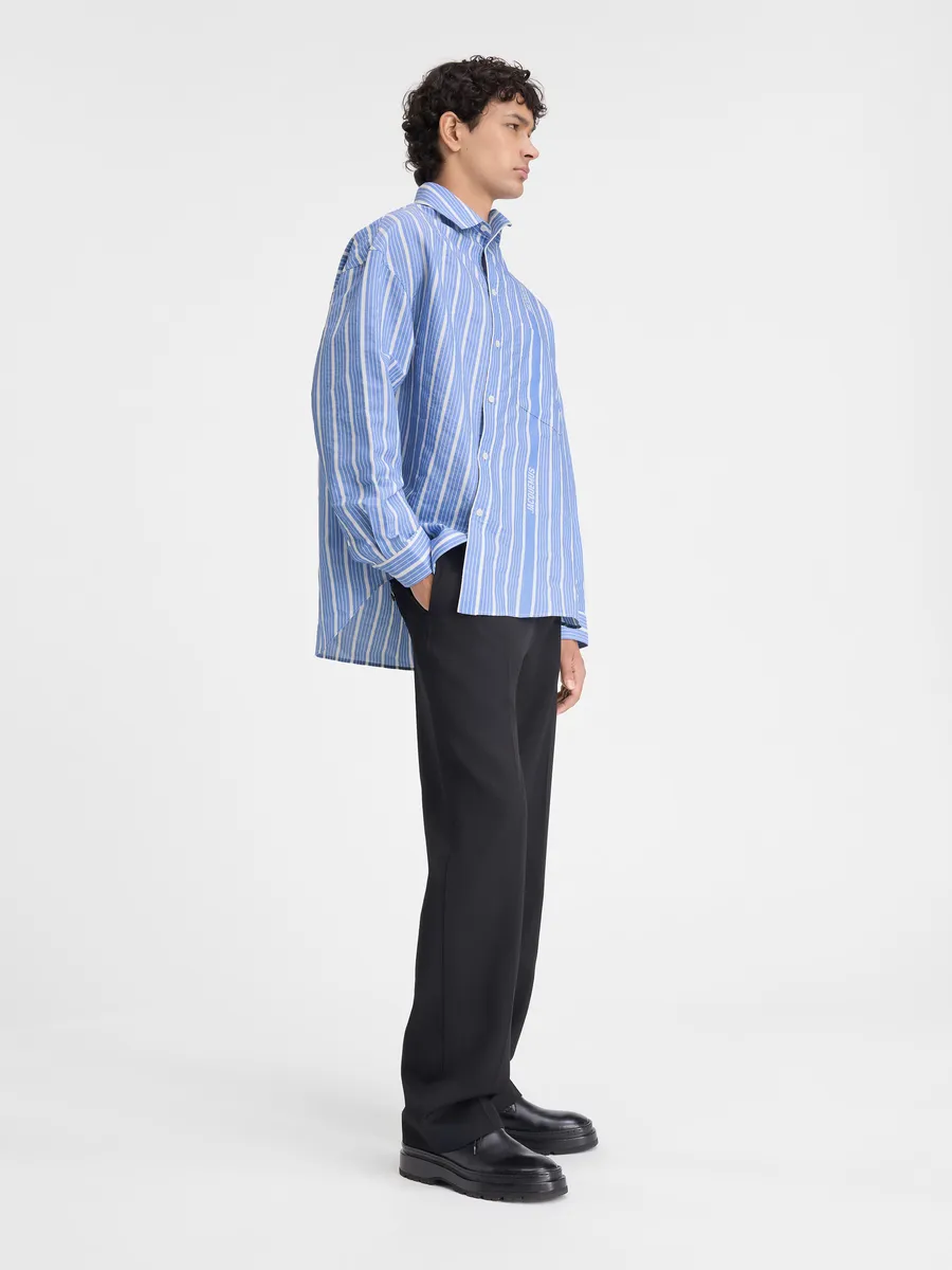 Асимметричная рубашка Cuadro Jacquemus, синий/белый
Асимметричная рубашка Cuadro Jacquemus, синий/белый