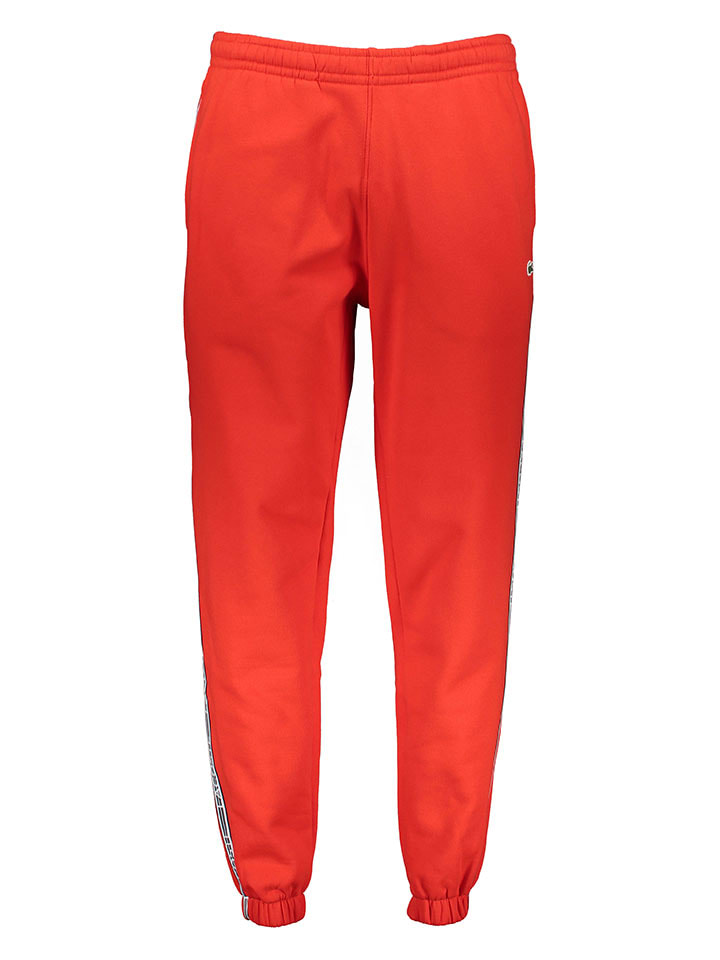 Красные спортивные штаны Lacoste
Красные спортивные штаны Lacoste