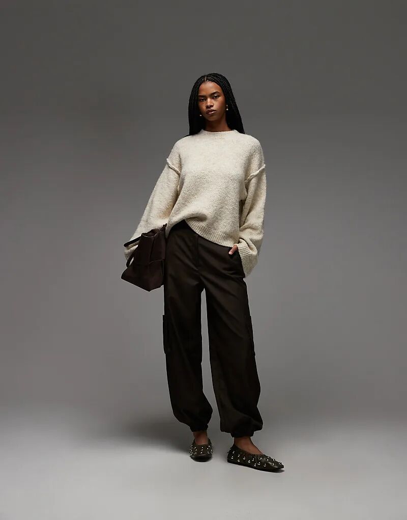 Вязаный джемпер ASOS DESIGN с открытыми швами из шерсти кремового цвета
Вязаный джемпер ASOS DESIGN с открытыми швами из шерсти кремового цвета