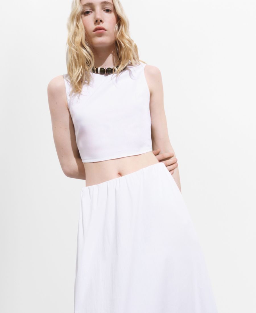 Женский укороченный топ с бантом на спине MANGO, White
Женский укороченный топ с бантом на спине MANGO, White