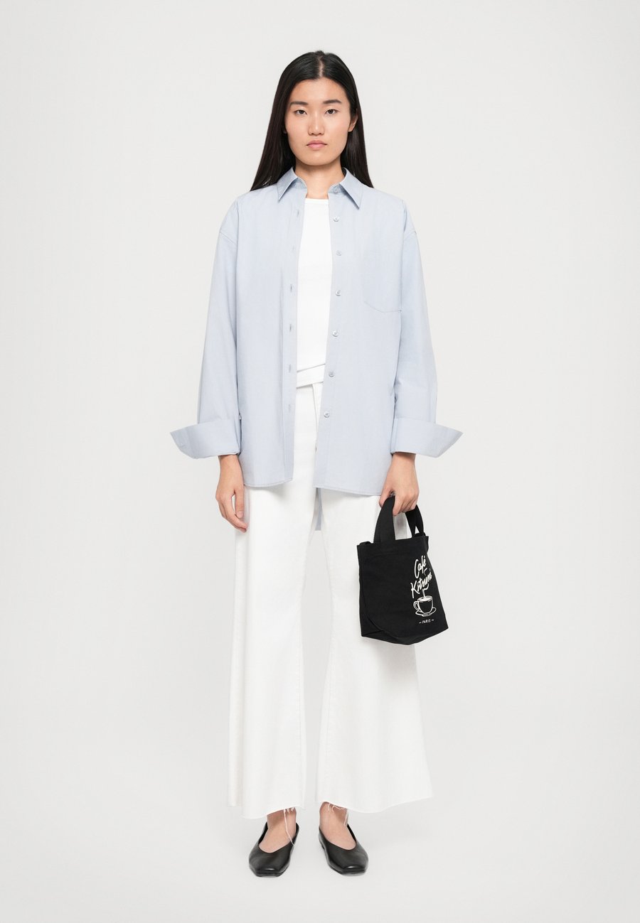 Сумка Café Kitsuné COFFEE CUP MINI, Black
Сумка Café Kitsuné COFFEE CUP MINI, Black