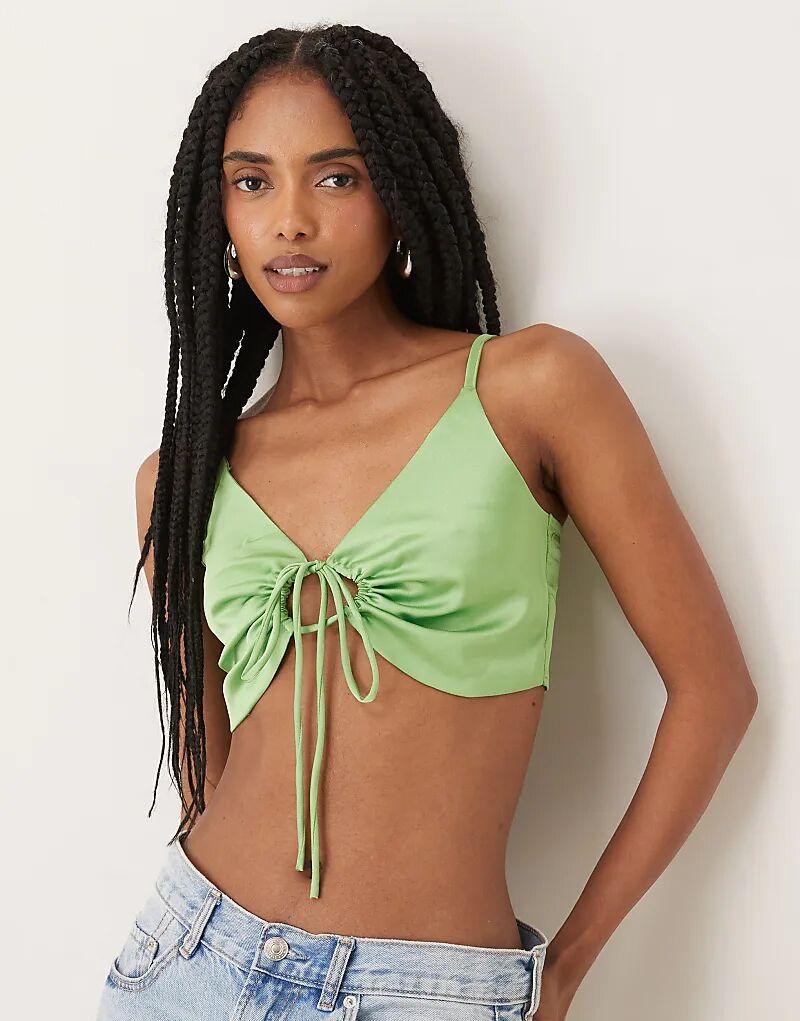 Укороченный топ Collective The Label Gathered с завязками спереди из яблочно-зеленого атласа
Укороченный топ Collective The Label Gathered с завязками спереди из яблочно-зеленого атласа