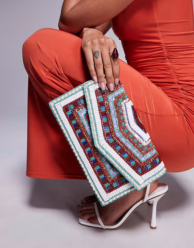 Сумка-конверт True Decadence с геометрическим узором и бисером в многоцветном исполнении
Сумка-конверт True Decadence с геометрическим узором и бисером в многоцветном исполнении