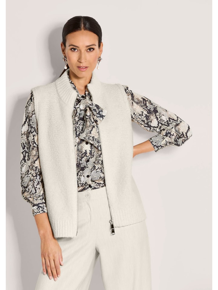 MADELEINE Модный жилет крупной вязки жемчужно-белого цвета
MADELEINE Модный жилет крупной вязки жемчужно-белого цвета