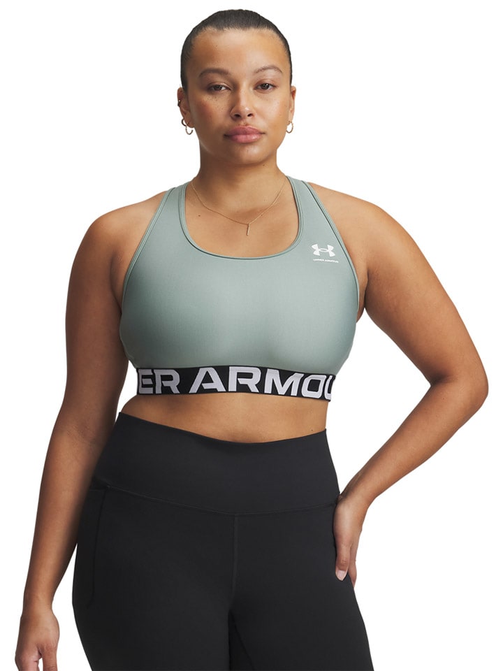 Спортивный бюстгальтер Under Armour
Спортивный бюстгальтер Under Armour