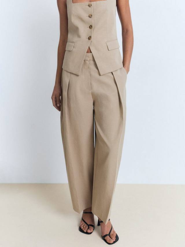 Брюки Olivia с бочкообразными штанинами Mango
Брюки Olivia с бочкообразными штанинами Mango