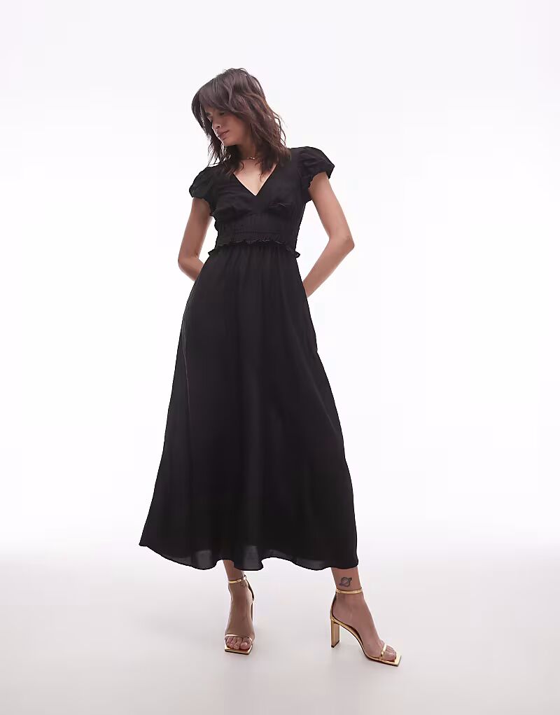 & Other Stories макси-платье с ярусным подолом и воланами на рукавах черного цвета
& Other Stories макси-платье с ярусным подолом и воланами на рукавах черного цвета