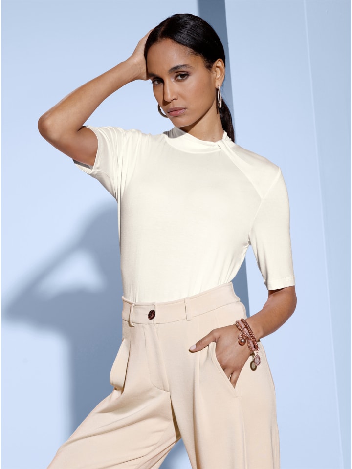 Рубашка с воротником-стойкой цвета экрю creation L
Рубашка с воротником-стойкой цвета экрю creation L