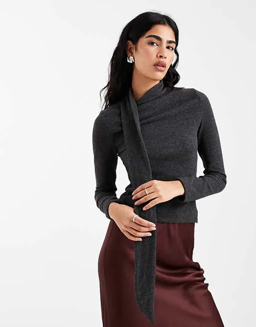 Серый супермягкий топ с длинными рукавами и шарфом ASOS DESIGN
Серый супермягкий топ с длинными рукавами и шарфом ASOS DESIGN