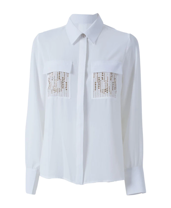 Белая блузка с длинными рукавами, украшенная стразами и заклепками на карманах. Relish, белый
Белая блузка с длинными рукавами, украшенная стразами и заклепками на карманах. Relish, белый