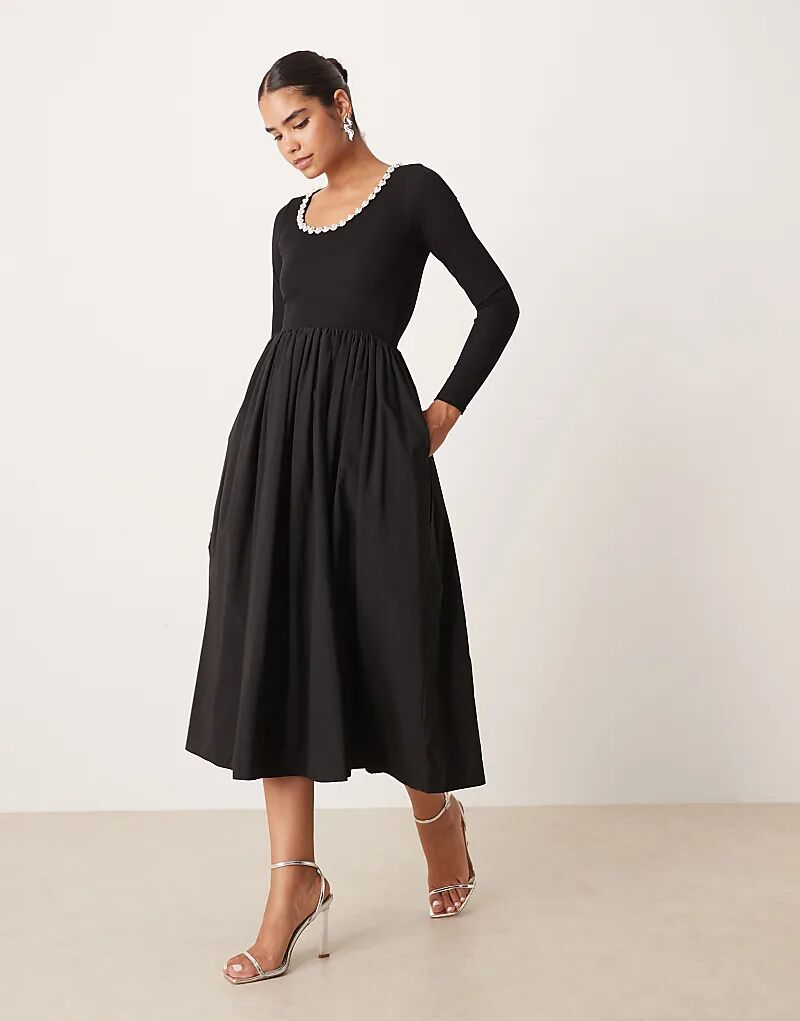 Платье миди Sister Jane из трикотажного микса с отделкой в рубчик и глубоким вырезом, с пышной юбкой, черного цвета
Платье миди Sister Jane из трикотажного микса с отделкой в рубчик и глубоким вырезом, с пышной юбкой, черного цвета