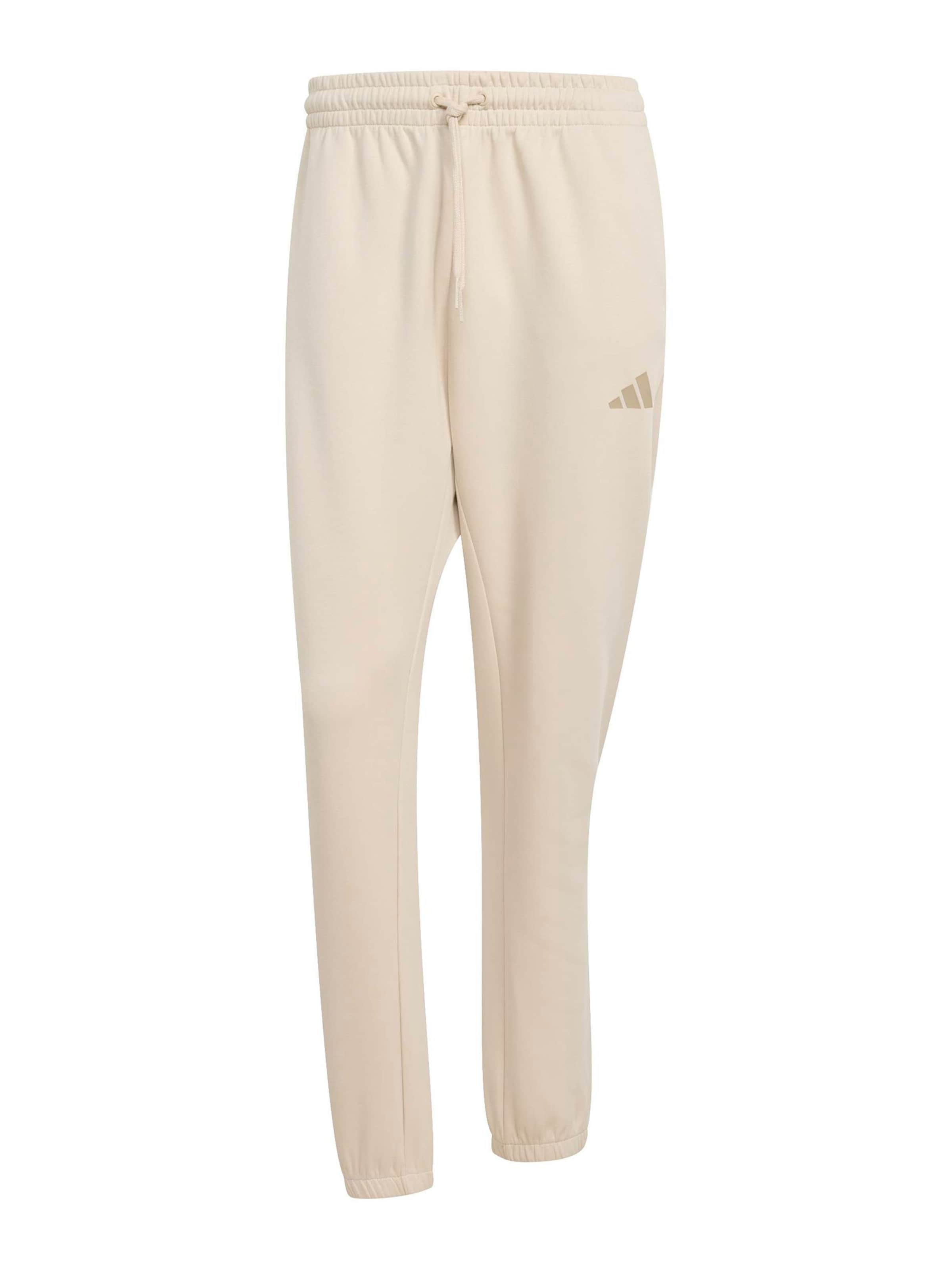Adidas Sportswear Узкие спортивные брюки в цвете крем, камел
Adidas Sportswear Узкие спортивные брюки в цвете крем, камел