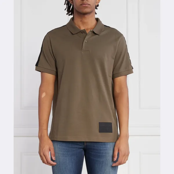 Рубашка поло стандартного кроя Armani Exchange, зеленый
Рубашка поло стандартного кроя Armani Exchange, зеленый