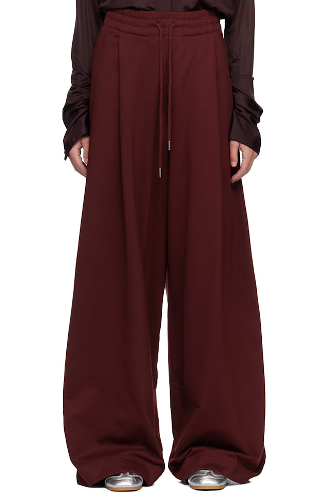 Dries Van Noten Свободные спортивные штаны бордового цвета
Dries Van Noten Свободные спортивные штаны бордового цвета