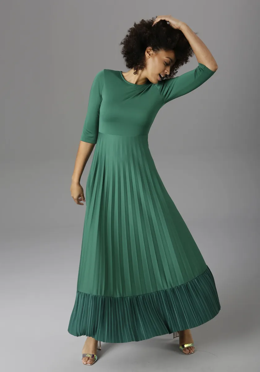 Платье макси Aniston CASUAL, юбка с плиссированным воланом, изумрудный
Платье макси Aniston CASUAL, юбка с плиссированным воланом, изумрудный