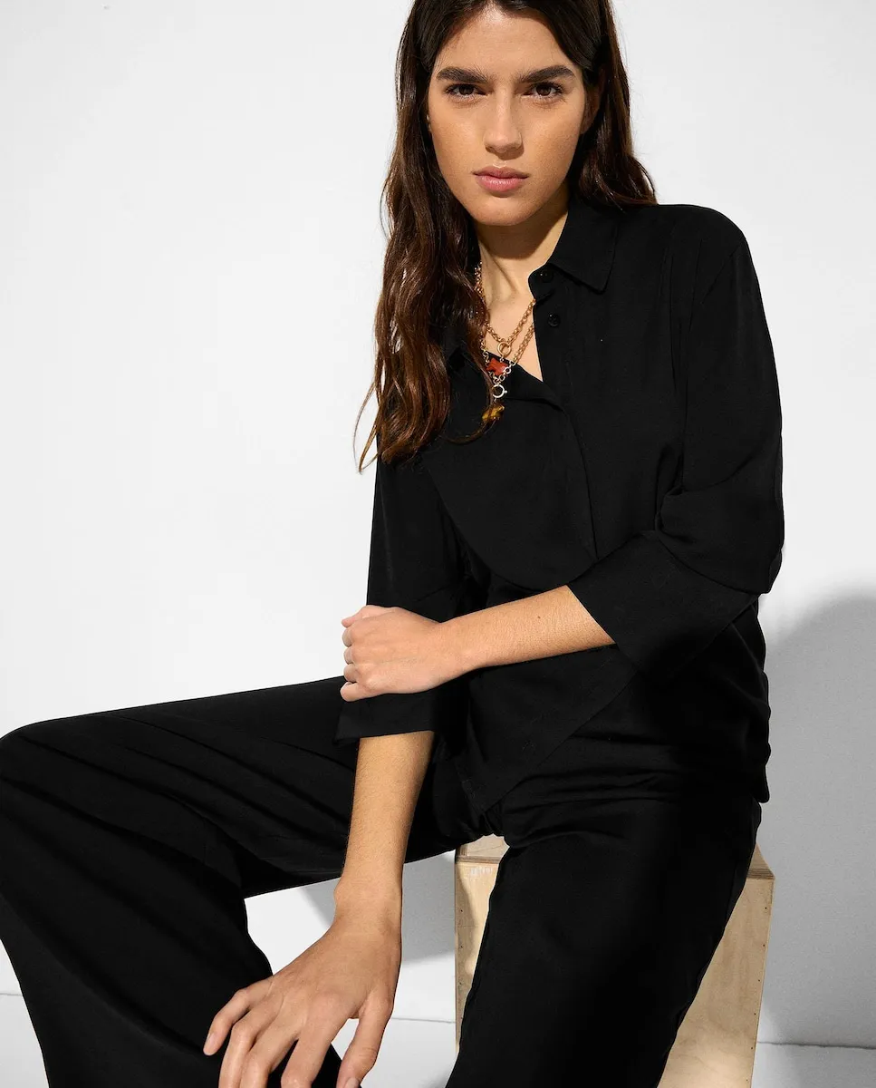 Женские струящиеся брюки с эластичным поясом, однотонные Parfois, черный
Женские струящиеся брюки с эластичным поясом, однотонные Parfois, черный