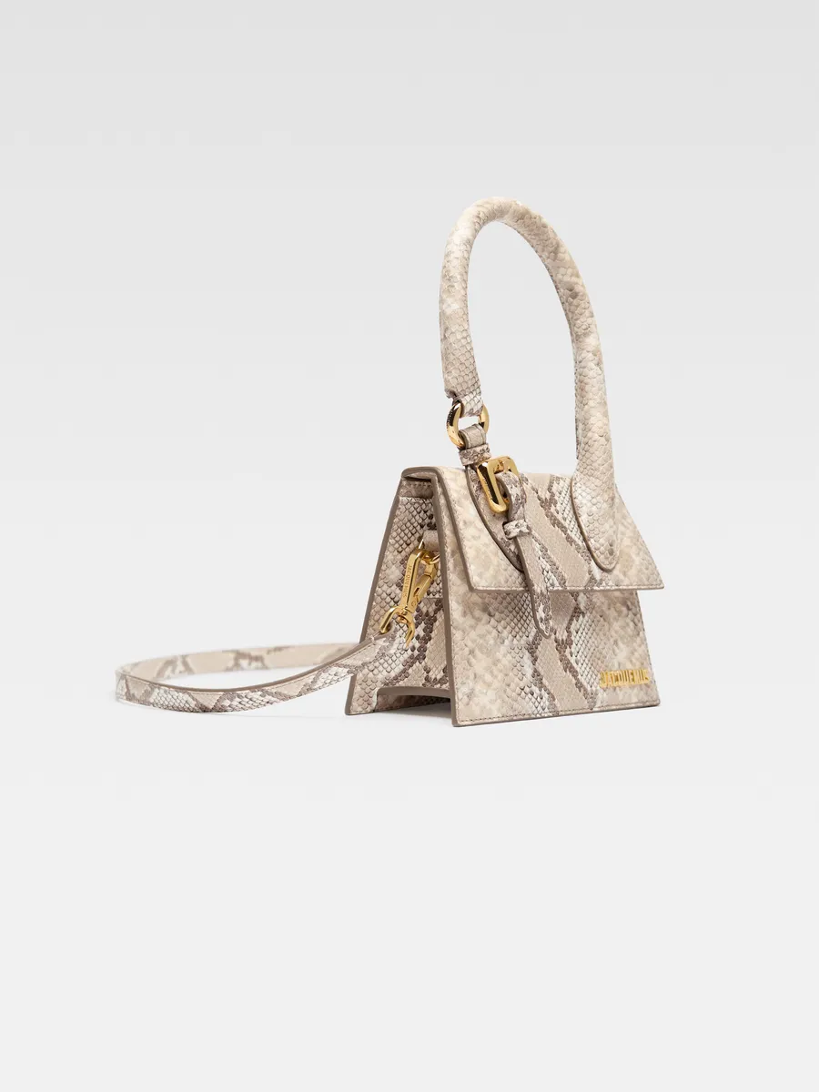 Фирменная сумочка с пряжкой букле Le Chiquito moyen Jacquemus, бежевый
Фирменная сумочка с пряжкой букле Le Chiquito moyen Jacquemus, бежевый