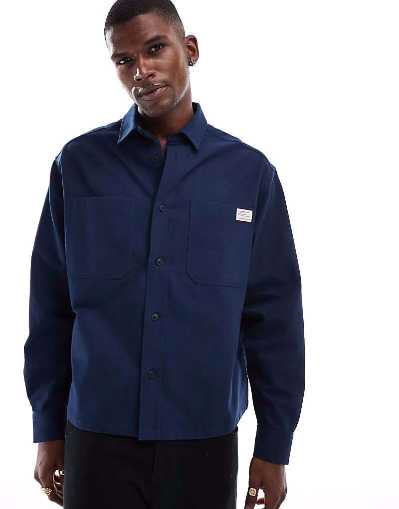 Рубашка свободного кроя из твила ASOS DESIGN темно-синего цвета
Рубашка свободного кроя из твила ASOS DESIGN темно-синего цвета