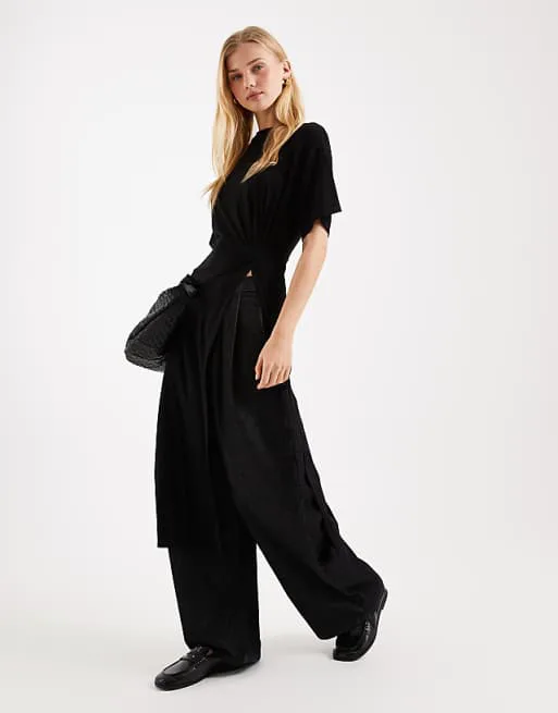 Черный удлиненный топ-туника с закрученными деталями ASOS DESIGN
Черный удлиненный топ-туника с закрученными деталями ASOS DESIGN