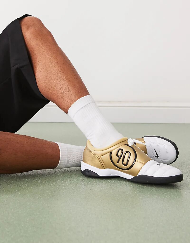 Кроссовки Nike T90 белого и металлического золота
Кроссовки Nike T90 белого и металлического золота