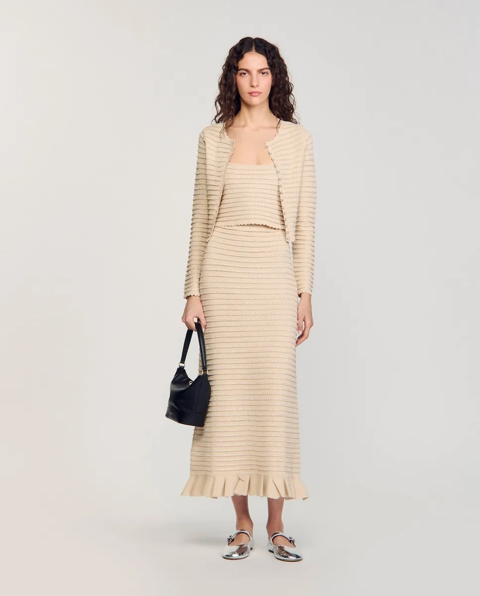 Длинная трикотажная юбка со стразами Sandro, бежевый
Длинная трикотажная юбка со стразами Sandro, бежевый