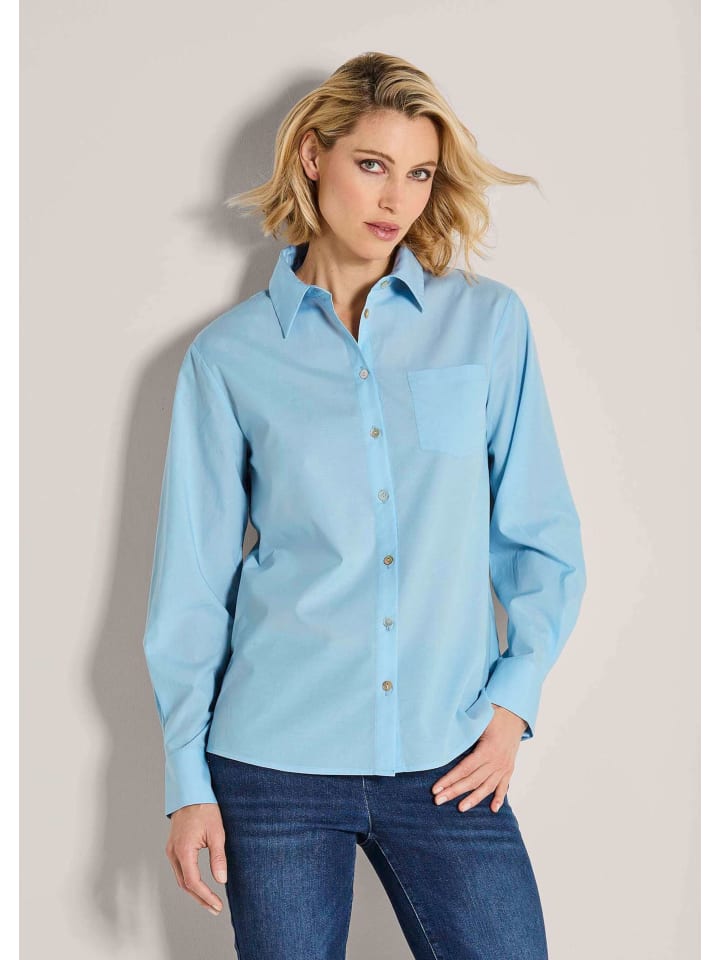 MADELEINE Элегантная блузка с длинными рукавами и воротником-стойкой синего цвета
MADELEINE Элегантная блузка с длинными рукавами и воротником-стойкой синего цвета