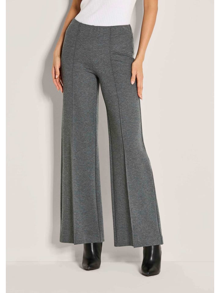 MADELEINE Широкие трикотажные брюки со складками, серо-коричневого цвета
MADELEINE Широкие трикотажные брюки со складками, серо-коричневого цвета