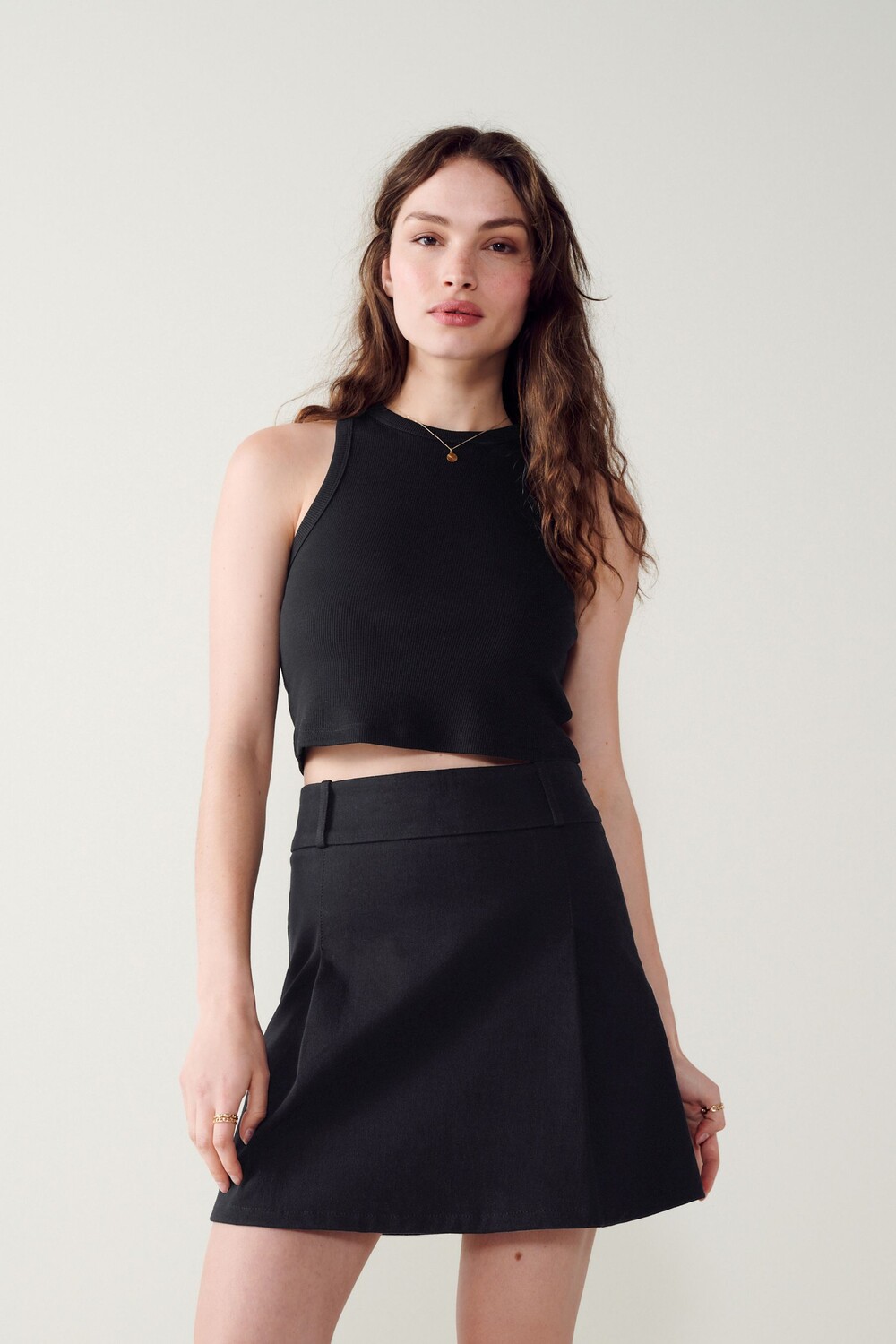 Плиссированная мини-юбка из трикотажа Next, черный
Плиссированная мини-юбка из трикотажа Next, черный