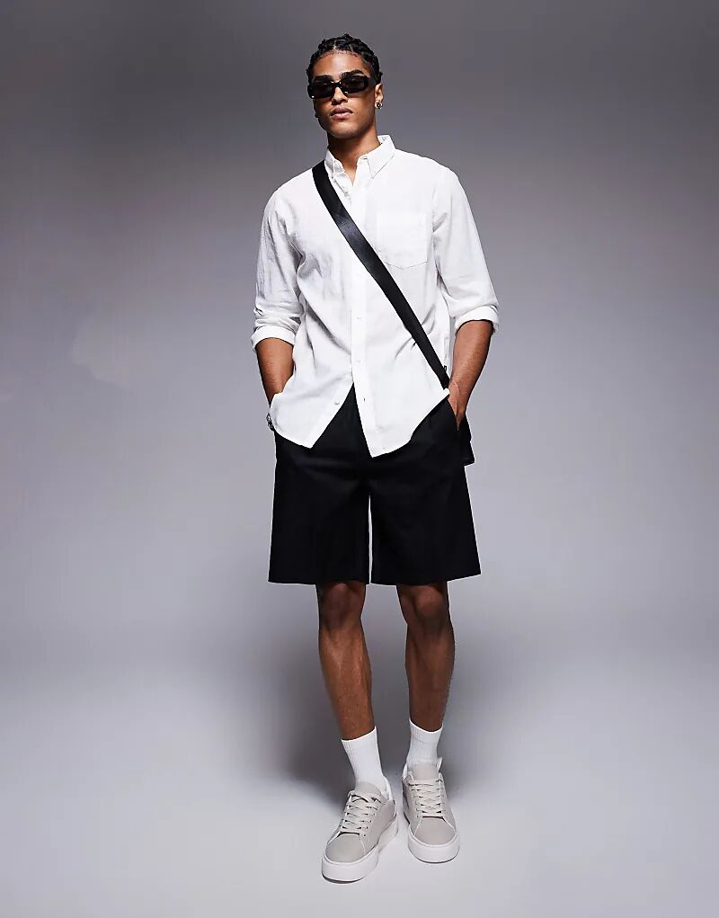 Свободные бермуды Bershka из льняной смеси черного цвета
Свободные бермуды Bershka из льняной смеси черного цвета