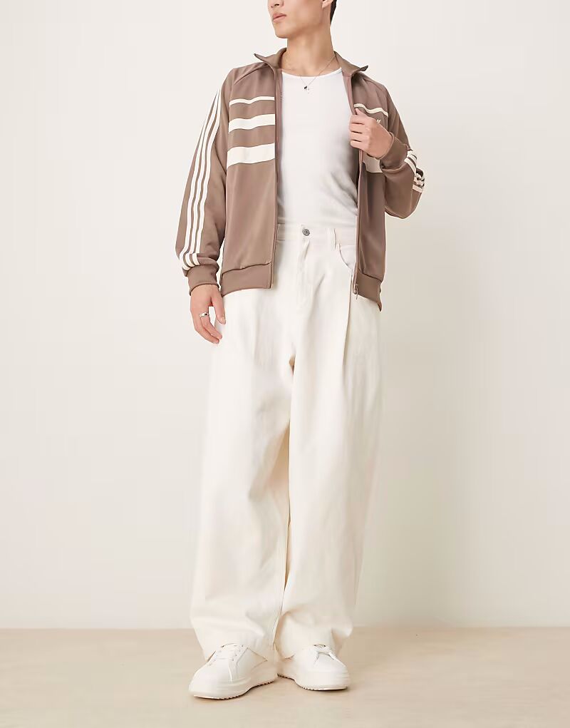 Мешковатые джинсы-баллоны ASOS DESIGN со складками на карманах цвета экрю
Мешковатые джинсы-баллоны ASOS DESIGN со складками на карманах цвета экрю