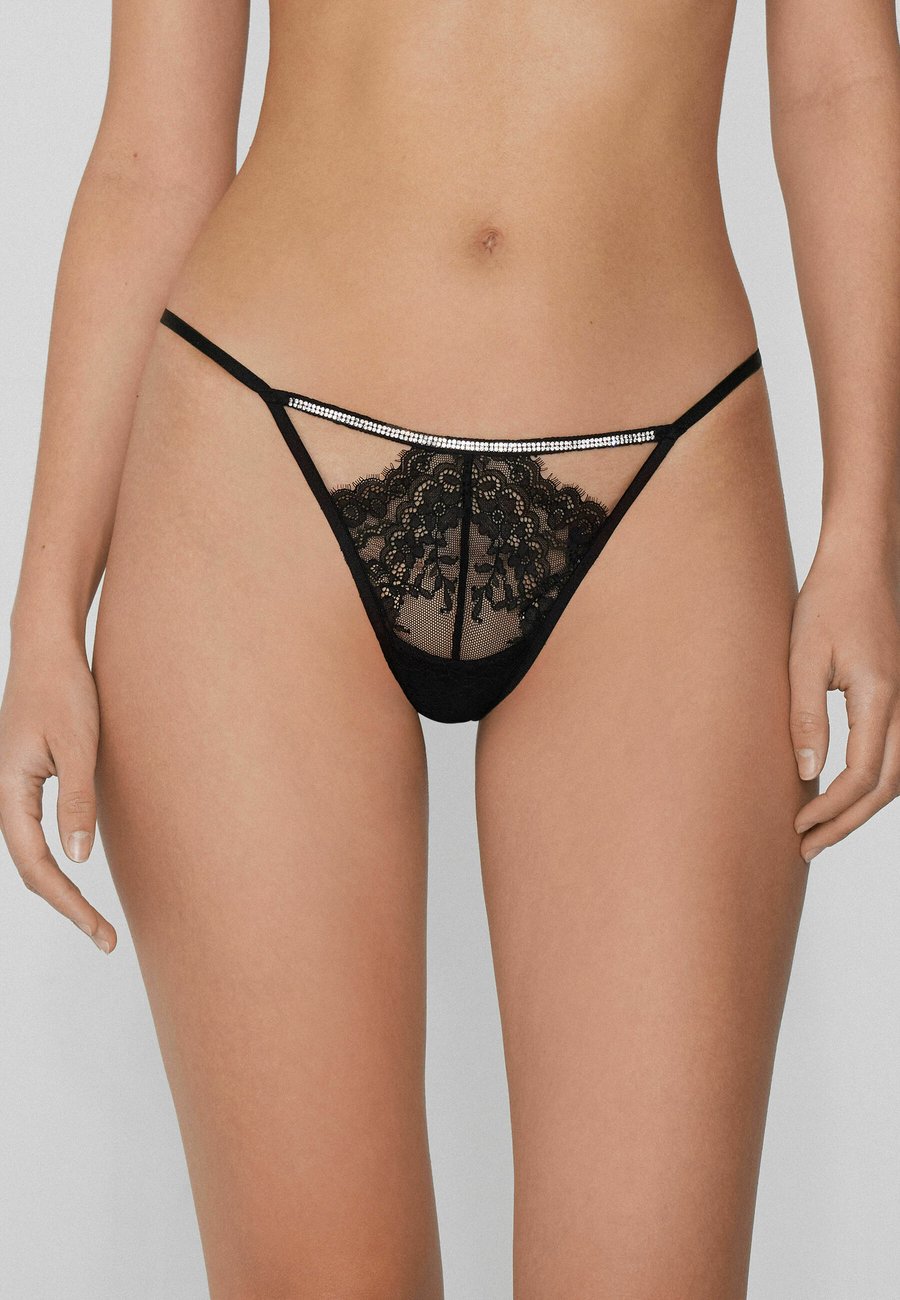 Трусы Tezenis Thong, Black/Mottled Black
Трусы Tezenis Thong, Black/Mottled Black