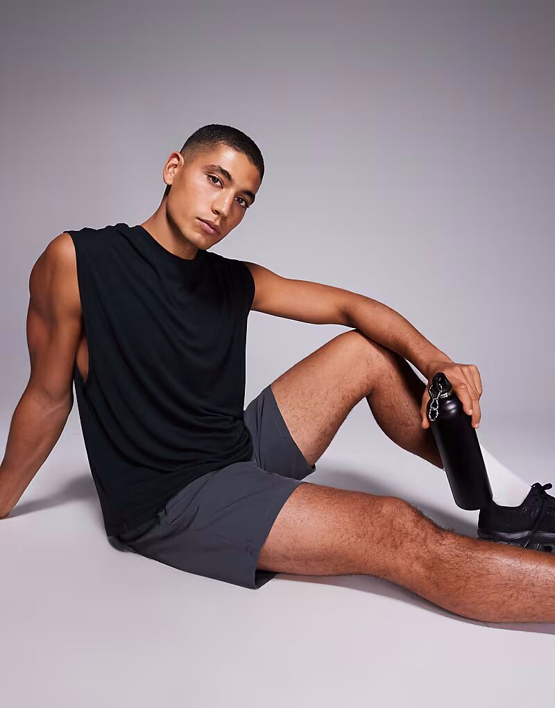 Быстросохнущая спортивная майка свободного кроя черного цвета 4505
Быстросохнущая спортивная майка свободного кроя черного цвета 4505