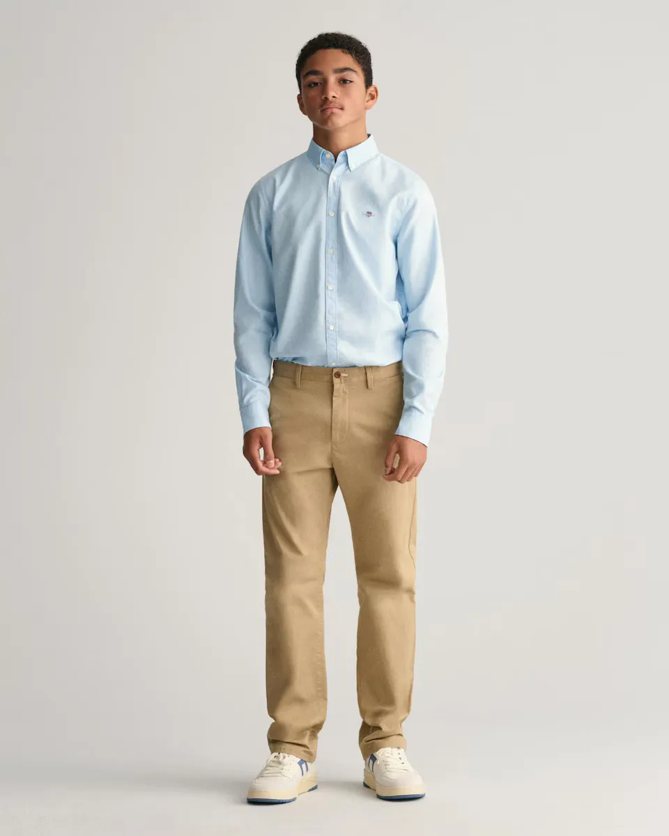 Однотонные брюки-чиносы для мальчика со шлевками для ремня Gant, бежевый
Однотонные брюки-чиносы для мальчика со шлевками для ремня Gant, бежевый