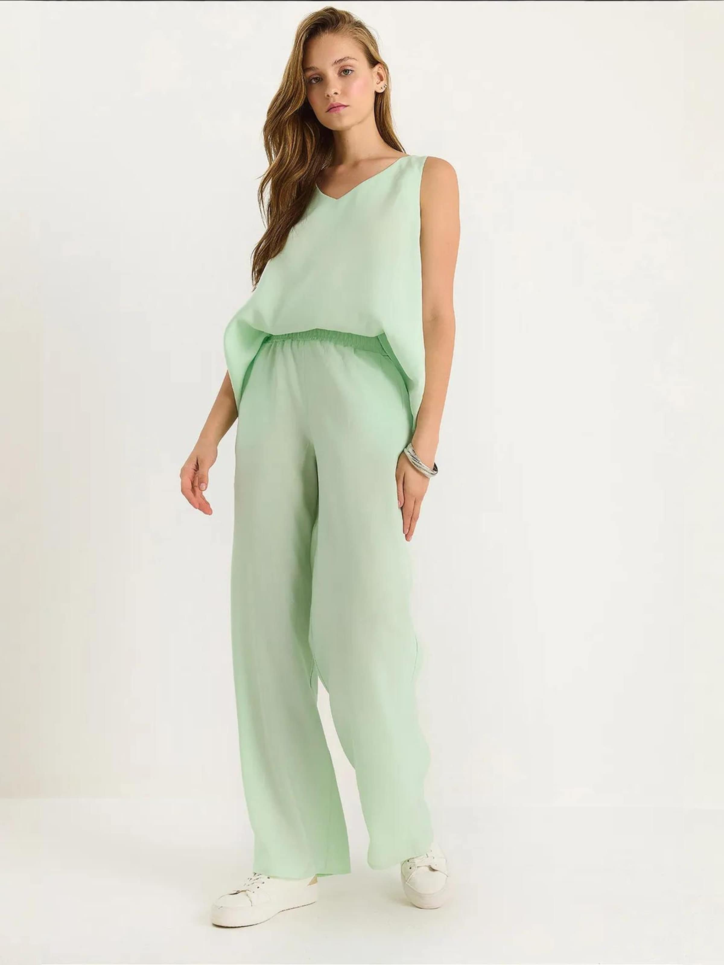 Bianco Lucci Костюм в цвете Mint
Bianco Lucci Костюм в цвете Mint