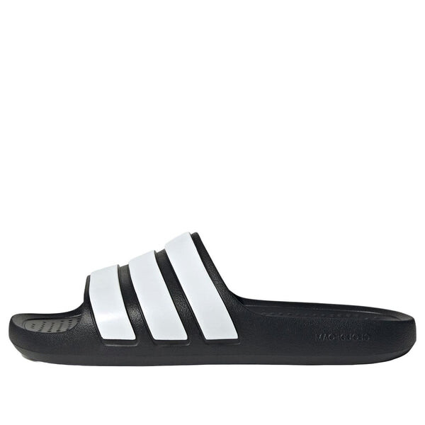 Тапочки adilette flow слайды Adidas, черный
Тапочки adilette flow слайды Adidas, черный