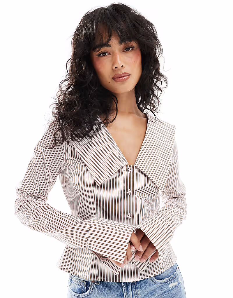 Рубашка из поплина с приталенным воротником в розовую полоску Asos Design
Рубашка из поплина с приталенным воротником в розовую полоску Asos Design