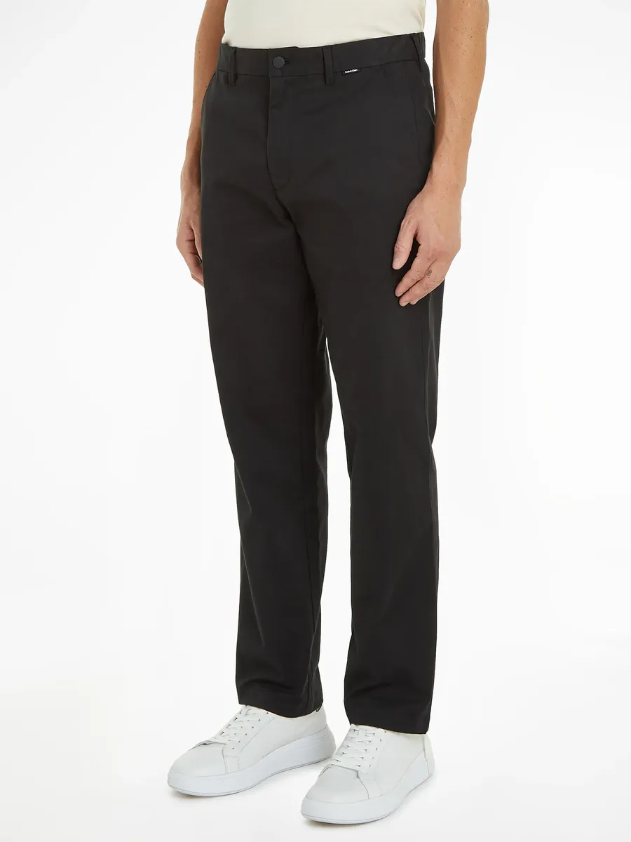 Брюки-чиносы Calvin Klein "MODERN TWILL REGULAR STRAIGHT" с тисненым логотипом, цвет Ck Black
Брюки-чиносы Calvin Klein "MODERN TWILL REGULAR STRAIGHT" с тисненым логотипом, цвет Ck Black