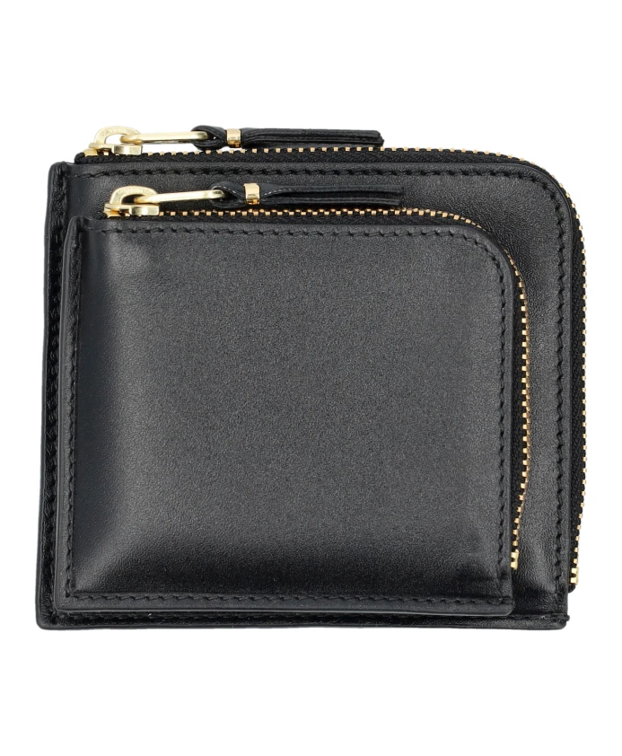 Черный кожаный кошелек на молнии с передним карманом. Comme Des Garã§Ons, черный
Черный кожаный кошелек на молнии с передним карманом. Comme Des Garã§Ons, черный