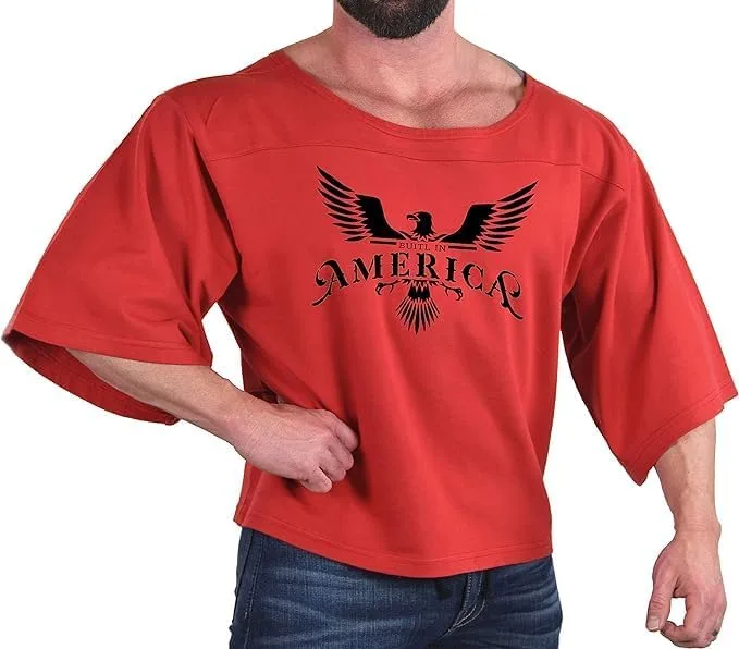 Мужская оверсайз футболка Rag Top в красном цвете, 3/4 рукав, с черным принтом Built in America Crazee Wear
Мужская оверсайз футболка Rag Top в красном цвете, 3/4 рукав, с черным принтом Built in America Crazee Wear